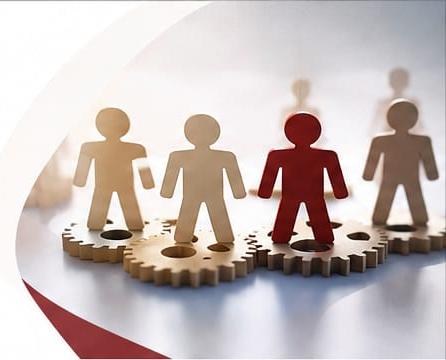 Dişliler üzerinde duran insan figürleri